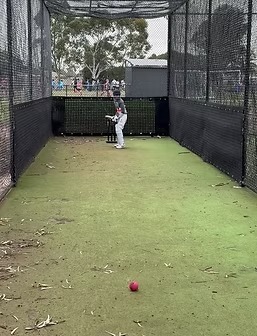 Indoor cricket batting practice in nets