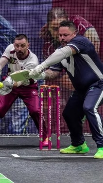 Wicket keeper attempting a stumping